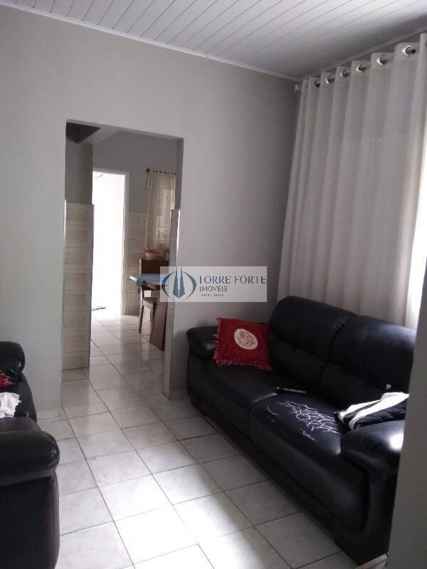 Casa à venda com 3 quartos, 100m² - Foto 1